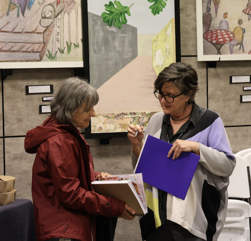 Two adults collaboratively interacting